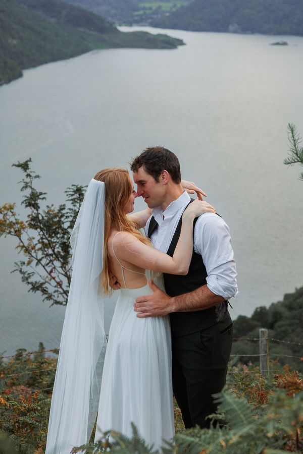 Couple embrace during elopement in the Lake District